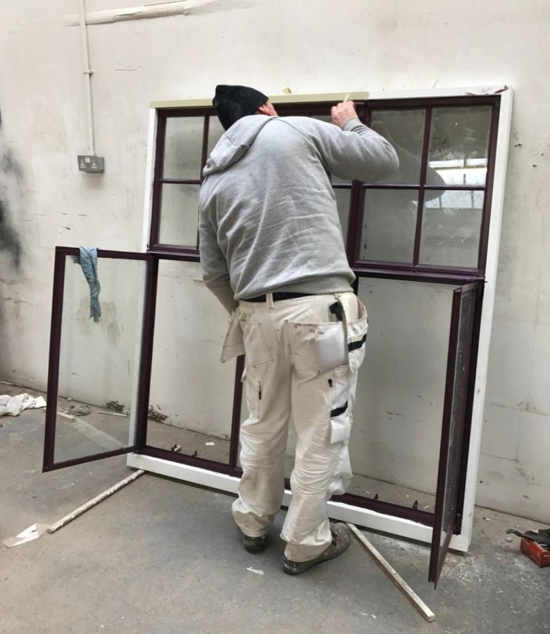 c.1920s steel-framed window undergoing workshop repair